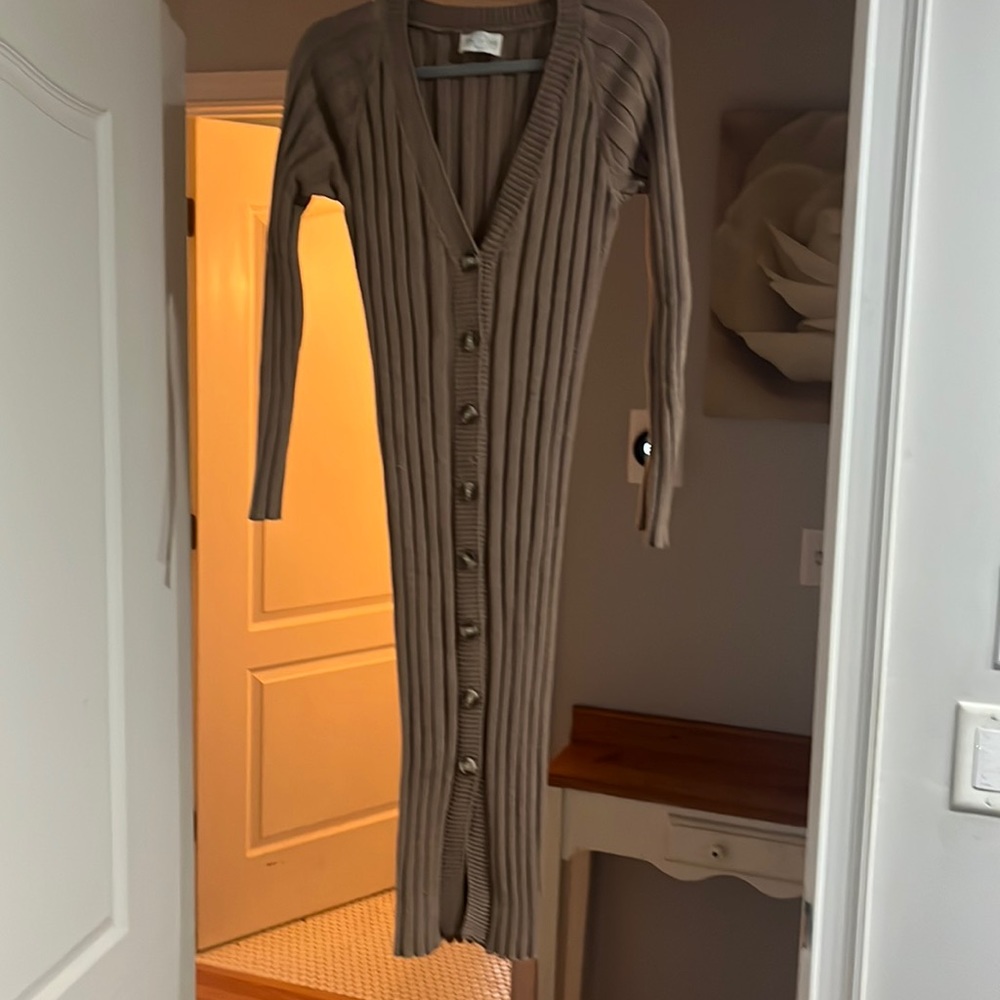 This can be either a sweater dress or to wear with jeans.  Jun & Ivy.